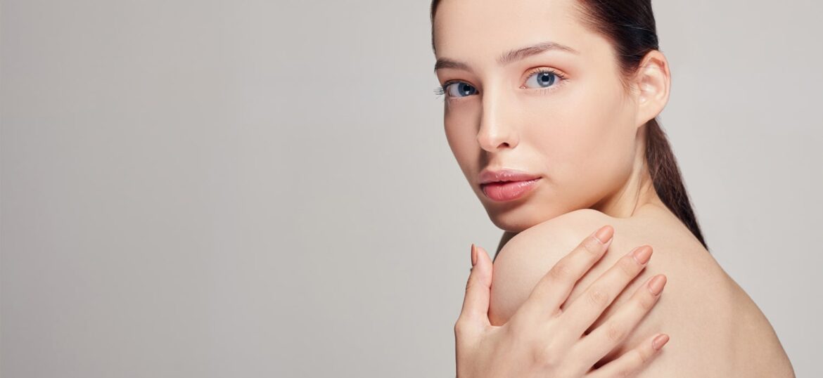 young-beautiful-woman-with-blue-eyes-full-lips-holds-hand-his-shoulder young-beautiful-woman-with-blue-eyes-full-lips-holds-hand-his-shoulder